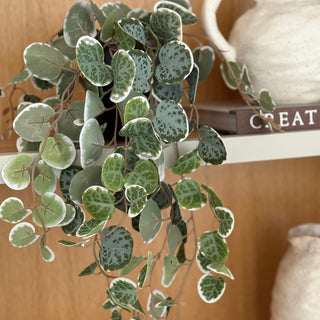 Faux Trailing String of Hearts on shelf 