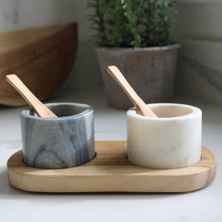 Grey and white marble salt and pepper set on wooden base 