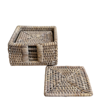 Two woven rattan boxes on a white background