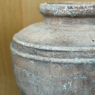 terracotta stone vase close up  